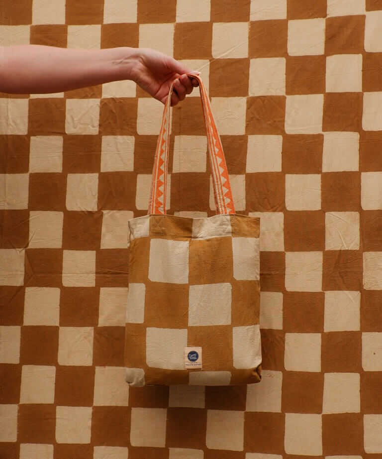 Plaid Checkmate Single dans un sac fourre-tout