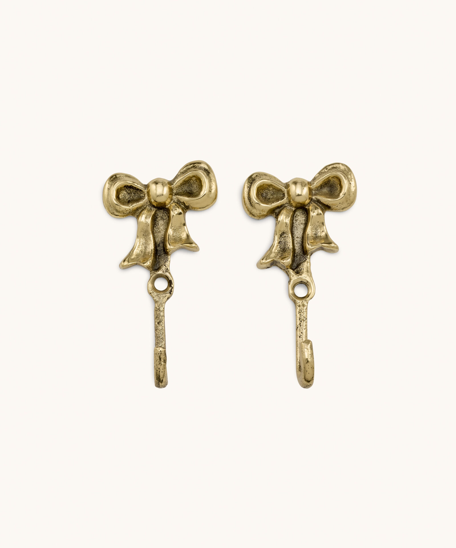 At Auction: Pair Vintage Brass Bow Wall Hooks